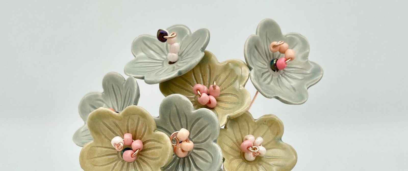 Ceramic flowers by Lucy Ormsby Pottery