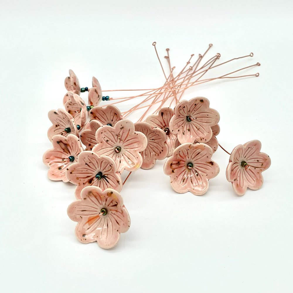 Lucy-Ormsby-pottery-ceramic-flower-speckled-pink-bunch