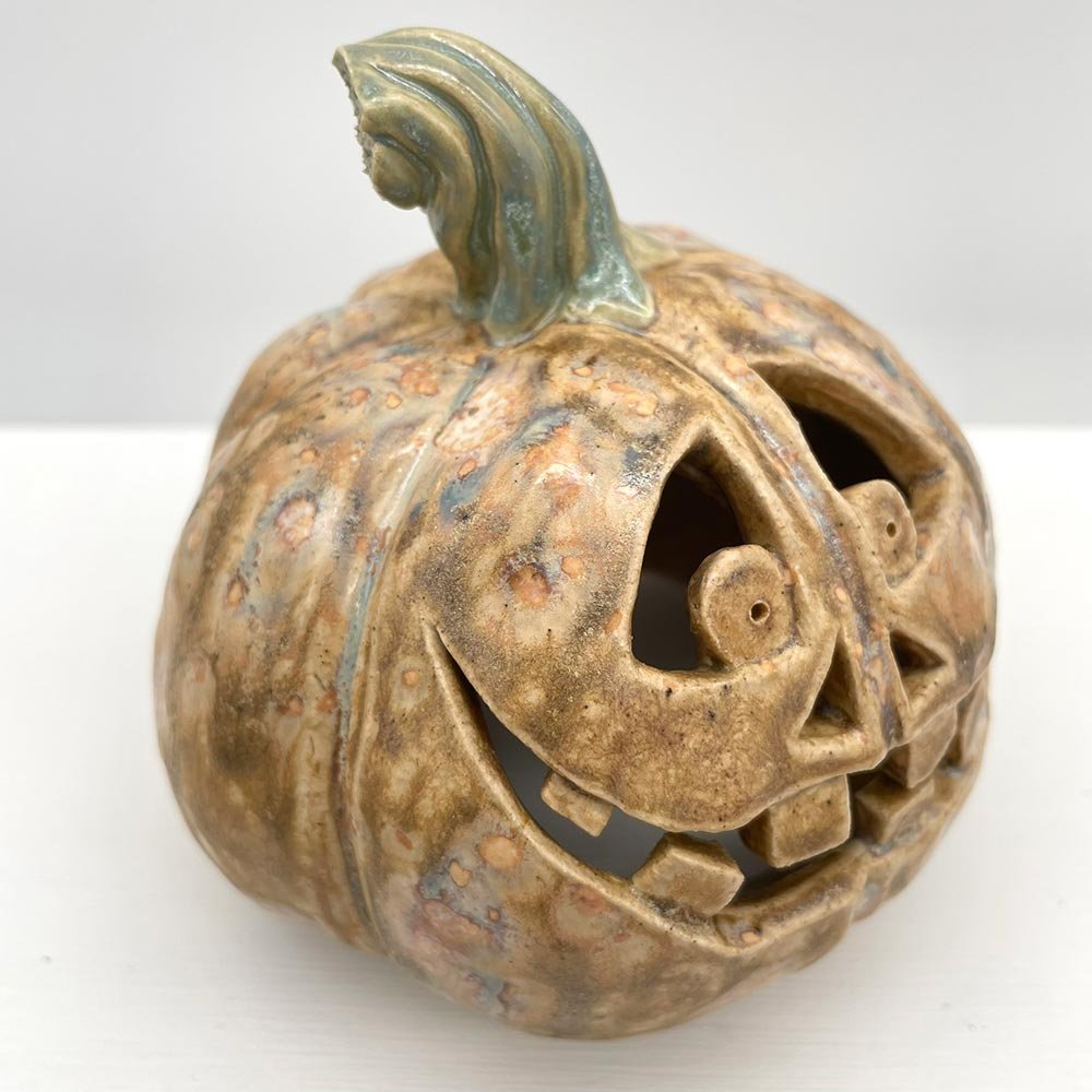 Carved ceramic pumpkin by Lucy Ormsby Pottery - close up