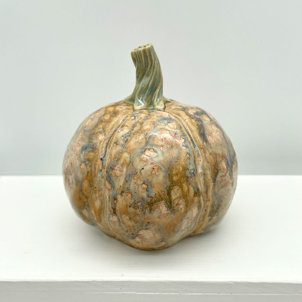 Carved ceramic pumpkin by Lucy Ormsby Pottery - from the back
