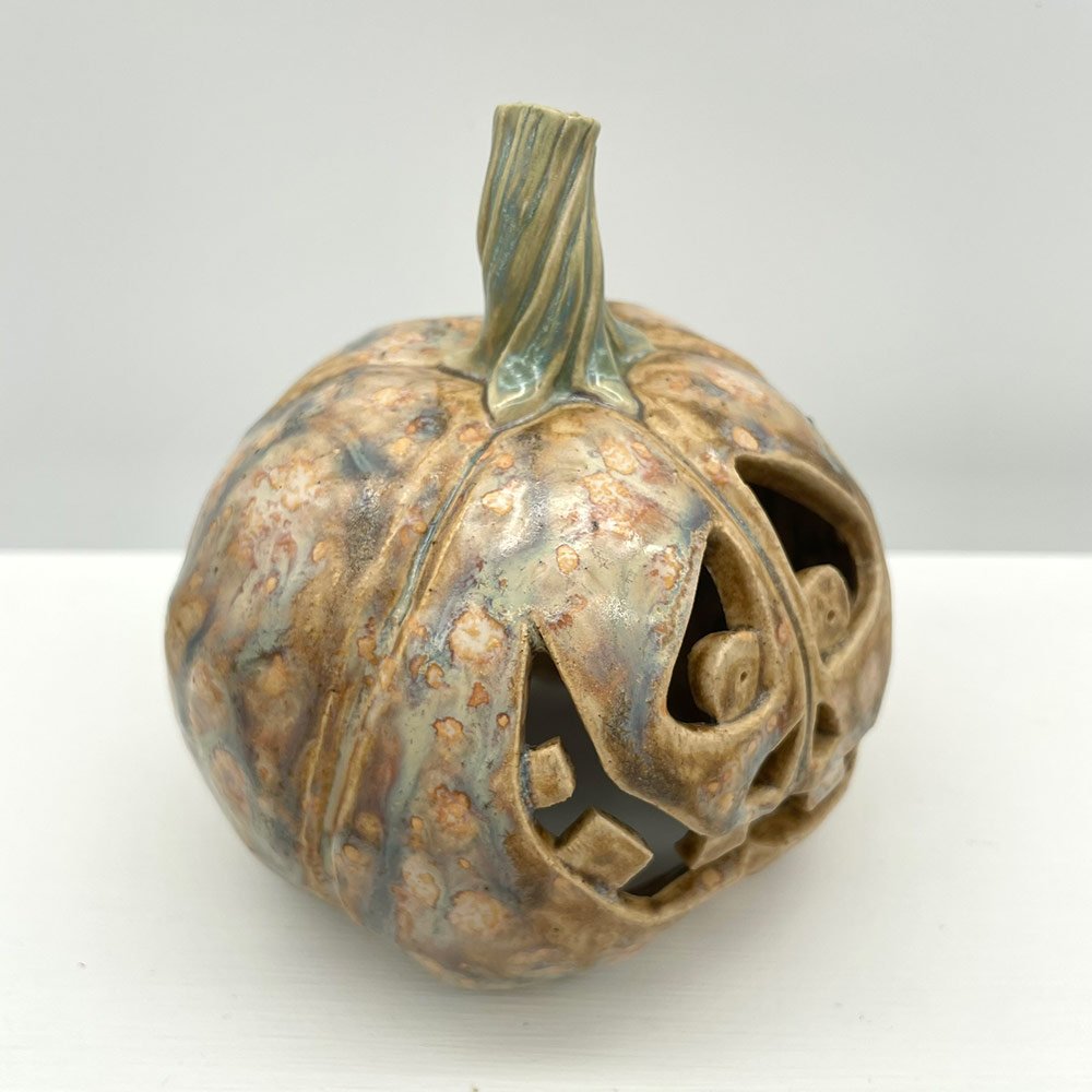 Carved ceramic pumpkin by Lucy Ormsby Pottery - close up
