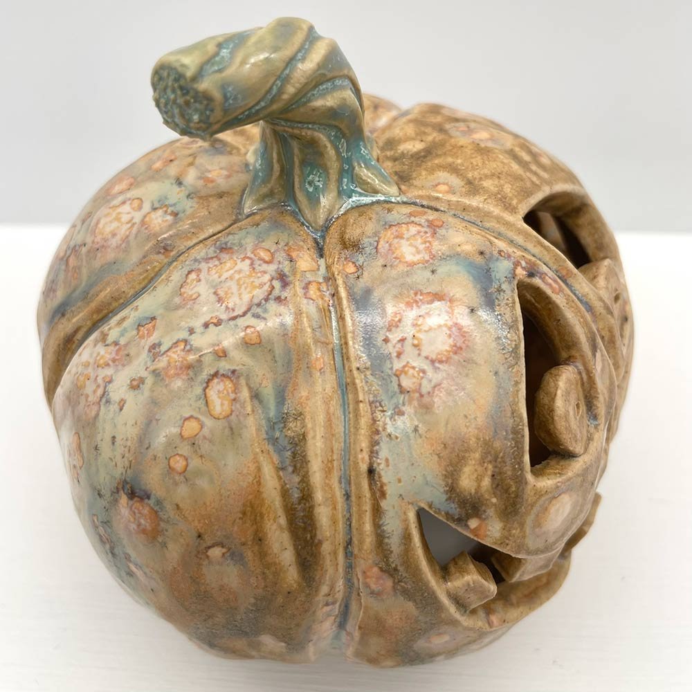 Carved ceramic pumpkin by Lucy Ormsby Pottery - close up