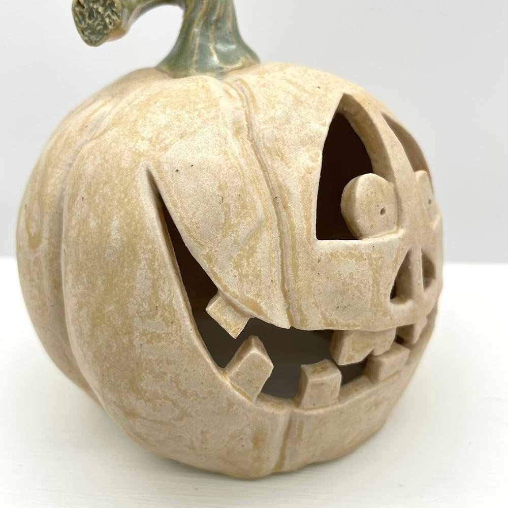 Carved ceramic pumpkin in white by Lucy Ormsby Pottery - close up