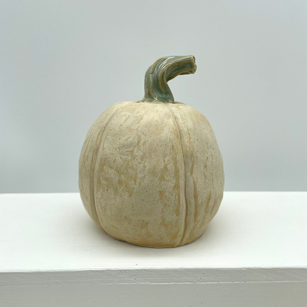 Carved ceramic pumpkin from Lucy Ormsby Pottery from the back