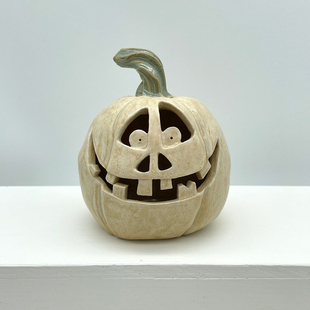 Carved ceramic pumpkin from Lucy Ormsby Pottery from the front