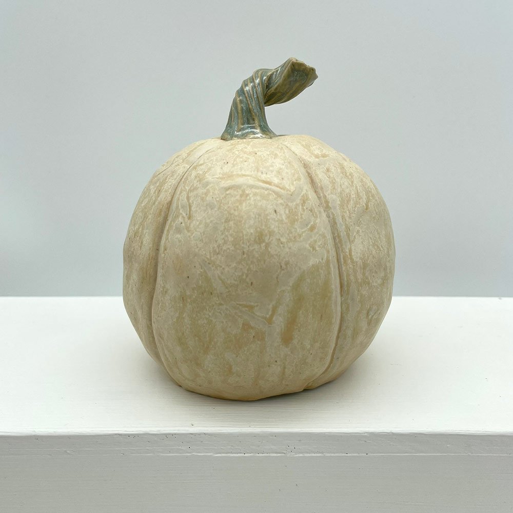 Carved ceramic pumpkin by Lucy Ormsby Pottery - from the back