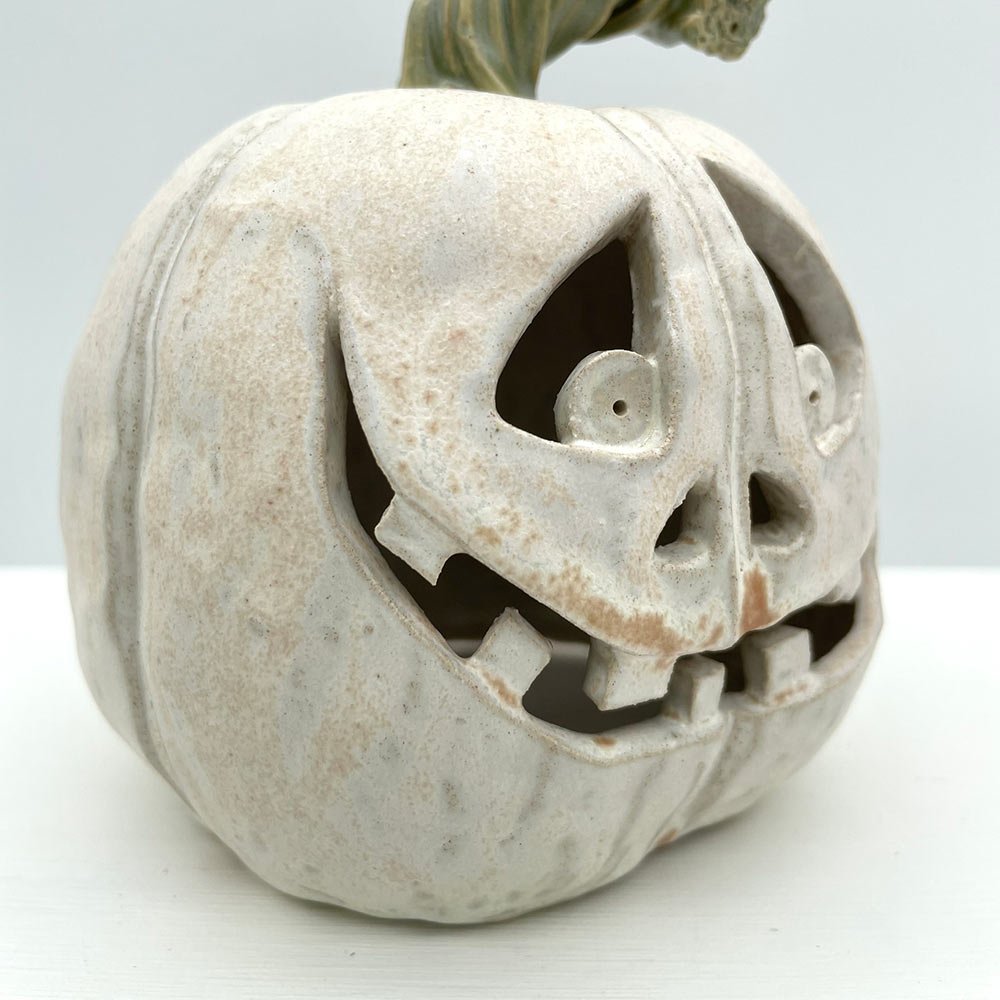 Carved ceramic pumpkin by Lucy Ormsby Pottery - close up