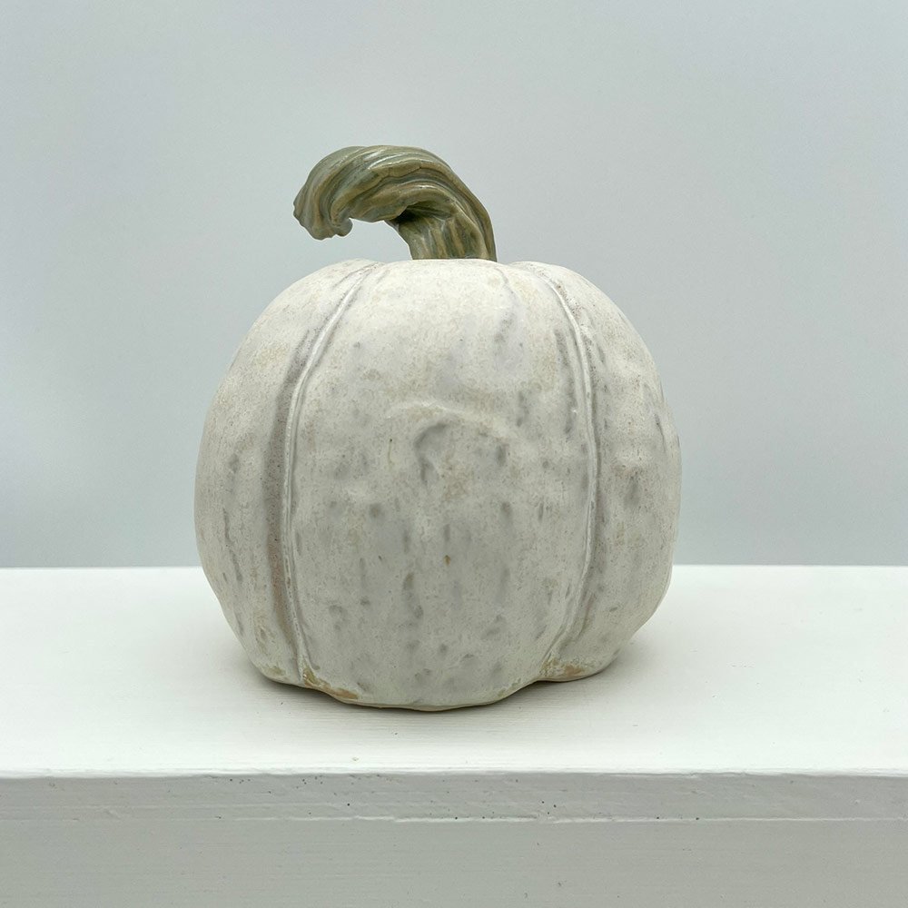 Carved ceramic pumpkin by Lucy Ormsby Pottery - from the back