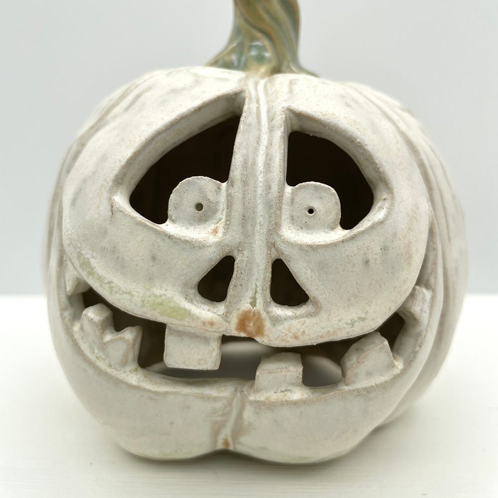 Carved ceramic pumpkin in white by Lucy Ormsby Pottery - close-up