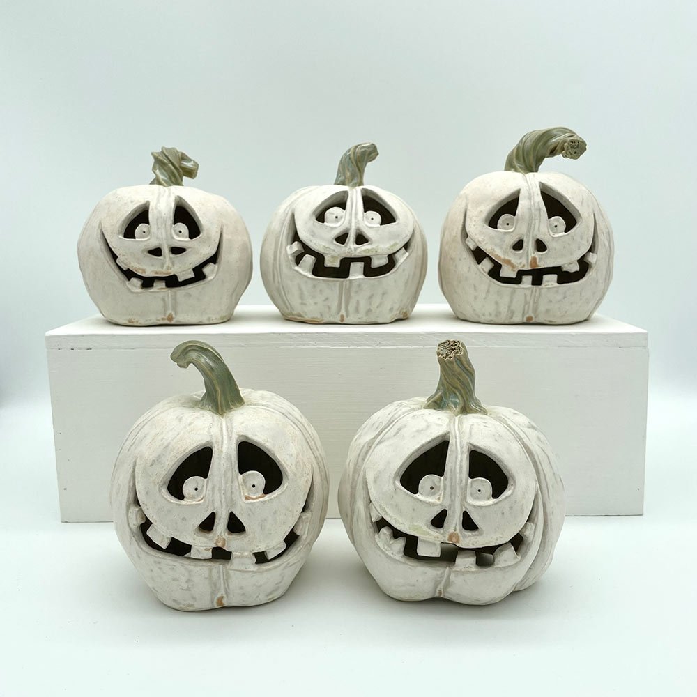 Carved ceramic Pumpkins in white made by Lucy Ormsby Pottery
