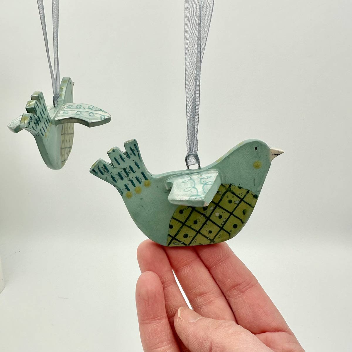 Handmade ceramic hanging bird decoration Lucy Ormsby Pottery