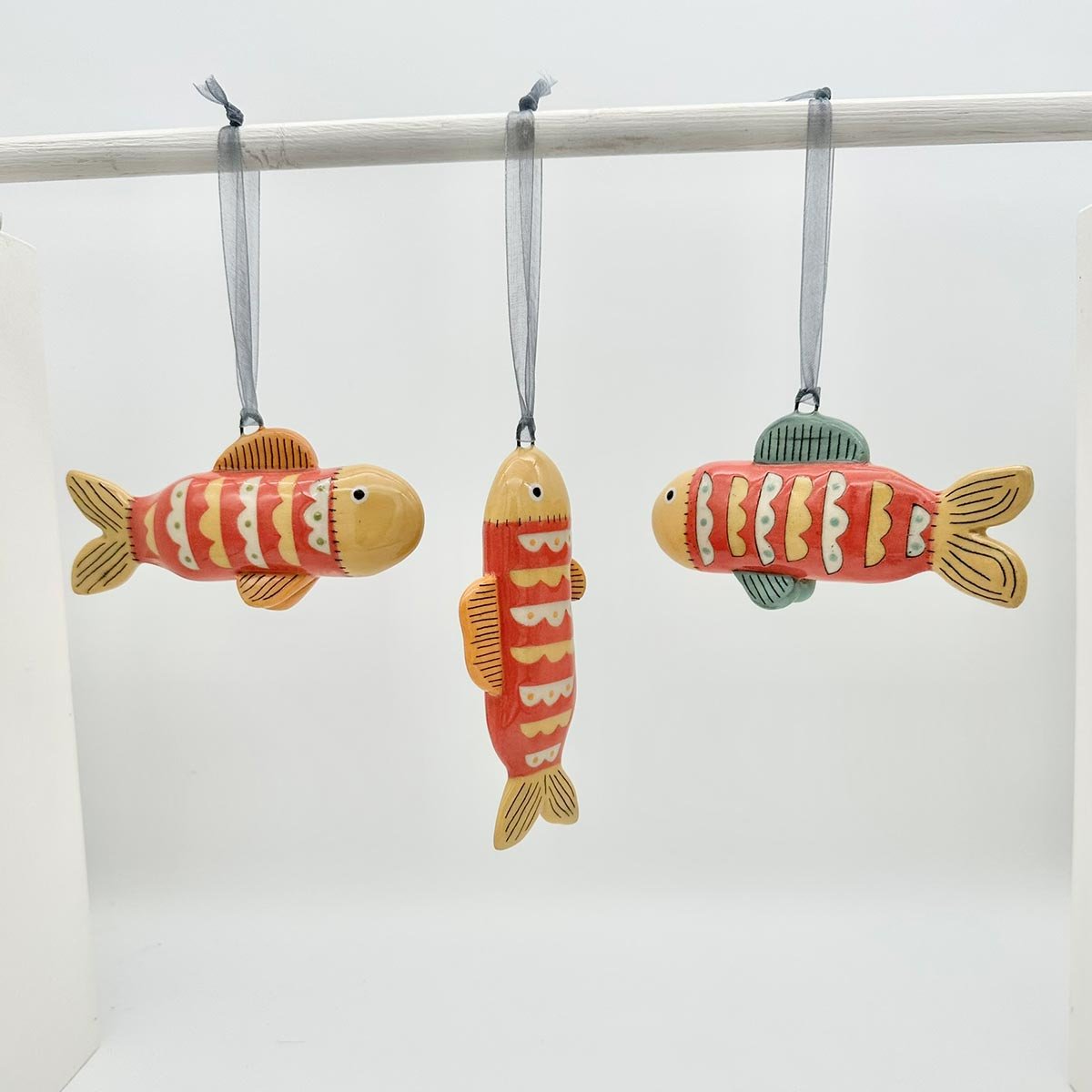 Lucy Ormby Pottery ceramic fish hanging decoration red yellow scales