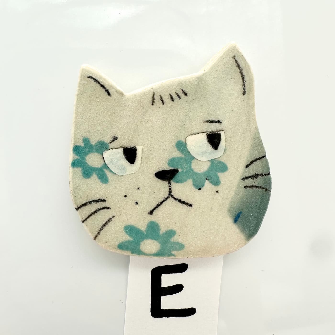 Blue cat magnet E